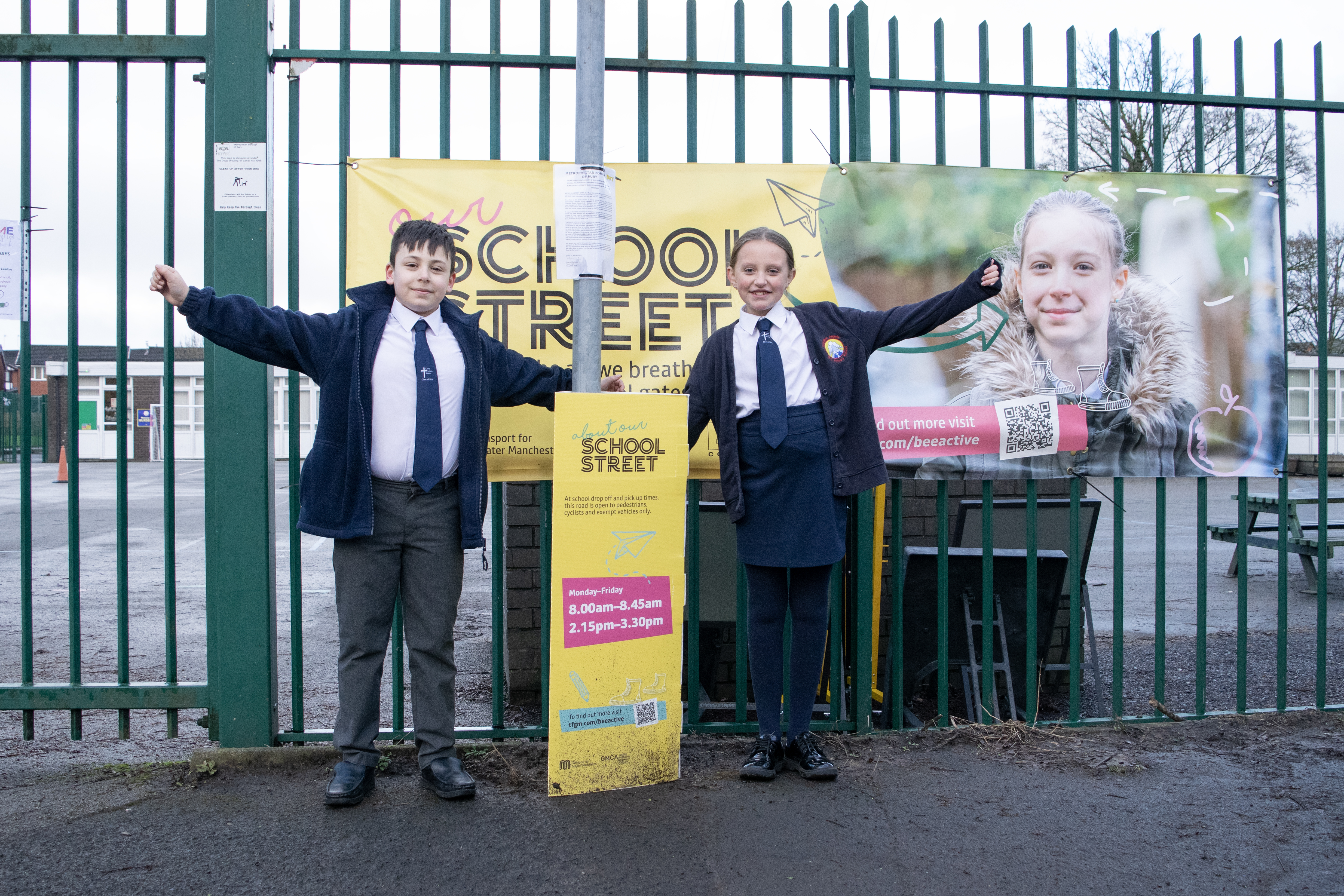 Two pupils stood outside a School Street
